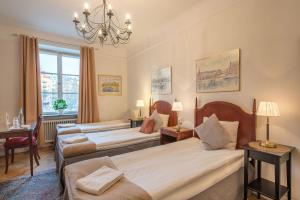 Postel nebo postele na pokoji v ubytování Wasa Park Hotel