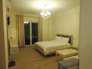 Postel nebo postele na pokoji v ubytování Hotel 3 Vellezerit