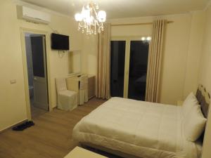 Postel nebo postele na pokoji v ubytování Hotel 3 Vellezerit