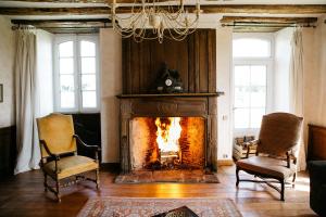 La Vieille Foulonnière : Chambres d'hôtes & Permaculture的休息区