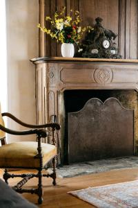 La Vieille Foulonnière : Chambres d'hôtes & Permaculture的休息区