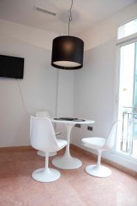 Televízia a/alebo spoločenská miestnosť v ubytovaní Happy Apartments Valencia – Lope de Vega