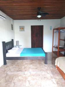 Postel nebo postele na pokoji v ubytování Villa Sueño Potrero