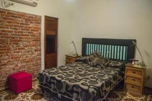 Feliza Hostel tesisinde bir odada yatak veya yataklar