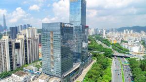 ภาพในคลังภาพของ Golden Central Hotel Serviced Residence-Xin Hao E Du金中环服务公寓新浩e都店 ในเซินเจิ้น