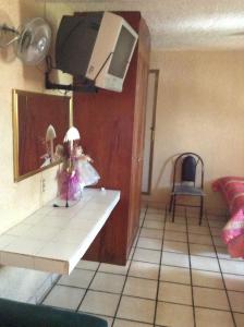 Kuchyň nebo kuchyňský kout v ubytování Hotel Palacio
