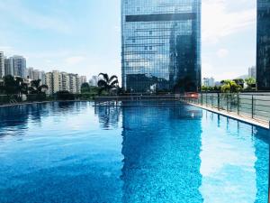 La pileta dentro o cerca de Golden Central Hotel Serviced Residence-Xin Hao E Du金中环服务公寓新浩e都店