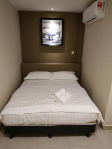 Postel nebo postele na pokoji v ubytování M Design Hotel @ Bangi 7