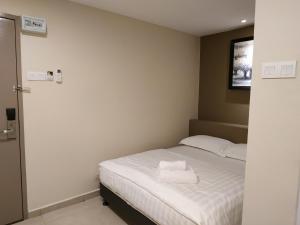 Postel nebo postele na pokoji v ubytování M Design Hotel @ Bangi 7