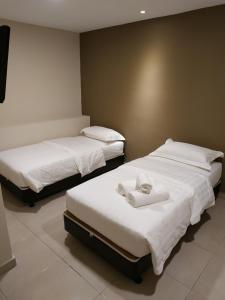 Postel nebo postele na pokoji v ubytování M Design Hotel @ Bangi 7