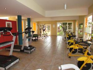 a gym with a bunch of exercise bikes in a room at Refugio de Mar in Miramar