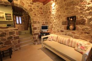 Prostor za sedenje u objektu Lithos Traditional Guest Houses