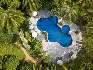 Bazén v ubytování Paradise Beach Resort, Koh Samui - SHA Extra Plus nebo v jeho okolí
