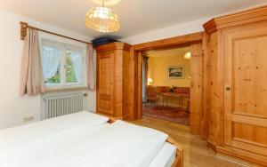 Postel nebo postele na pokoji v ubytování Stoll's Hotel Alpina