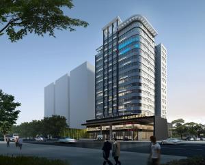 a rendering of a building with people walking in front of it at Fairfield by Marriott Guangzhou Tianhe Park in Guangzhou