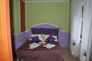Postel nebo postele na pokoji v ubytování B&B L'Ancora