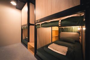Bunk bed o mga bunk bed sa kuwarto sa Getcha Hostel