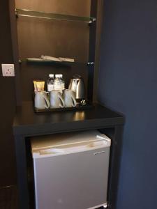 Kuchyň nebo kuchyňský kout v ubytování Artworks Hotel Ipoh