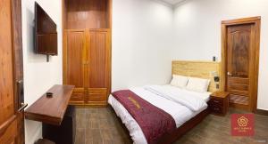 Voodi või voodid majutusasutuse Bảo Thịnh 2 Hotel toas