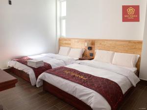 Voodi või voodid majutusasutuse Bảo Thịnh 2 Hotel toas