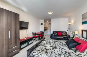Postel nebo postele na pokoji v ubytování Casa Atlantis Playa Roca