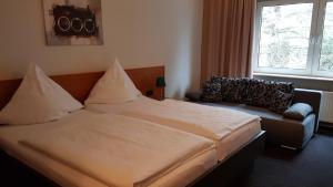 Letto o letti in una camera di Hotel Walz
