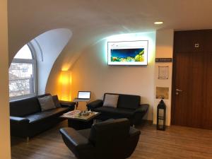 Ein Sitzbereich in der Unterkunft Skycity Hotel Atrigon