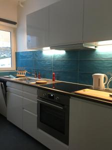 Virtuvė arba virtuvėlė apgyvendinimo įstaigoje Bleu Bambou