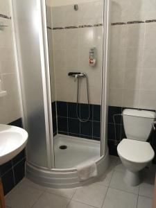 Koupelna v ubytování Hotel Tři Růže