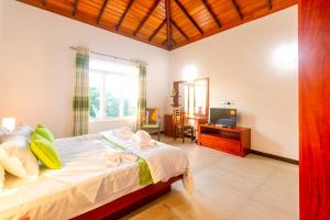 Postel nebo postele na pokoji v ubytování Cogent Holiday Home + 37 fotografií