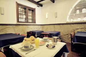 ห้องอาหารหรือที่รับประทานอาหารของ Rainha Santa Isabel - Óbidos History Hotel