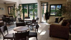 Posezení v ubytování Hotel Au Val Doré