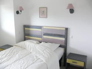 Postel nebo postele na pokoji v ubytování Gîte la Sapinière