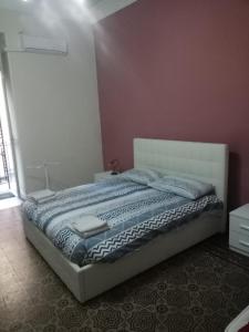 Postel nebo postele na pokoji v ubytování casa Giuseppe