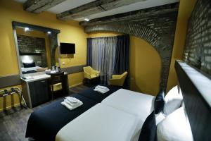Postel nebo postele na pokoji v ubytování City Hotel Amsterdam + 37 fotografií