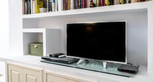 TV a/nebo společenská místnost v ubytování Apartamento Cadiz Paradiso