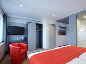 Uma cama ou camas num quarto em Amel Mitte Bed & Breakfast