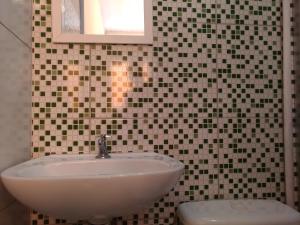 Een badkamer bij Pousada Soft Brooklin