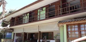Casarão Villa al Mare的阳台或露台