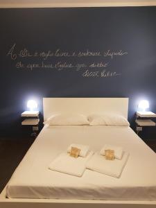 Letto o letti in una camera di AFFITTACAMERE VIA DEI MILLE