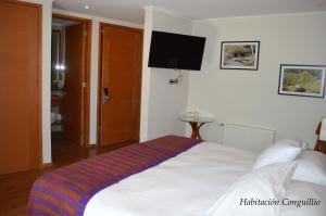Ein Bett oder Betten in einem Zimmer der Unterkunft Cocurantu Hotel Boutique