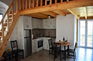 A kitchen or kitchenette at Christos Raches traditional houses
