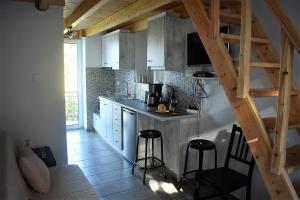 A kitchen or kitchenette at Christos Raches traditional houses