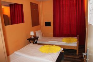 Postel nebo postele na pokoji v ubytování Hotel Praha Club bed & breakfast