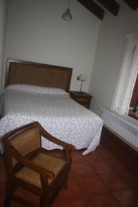 מיטה או מיטות בחדר ב-Casa Lao II