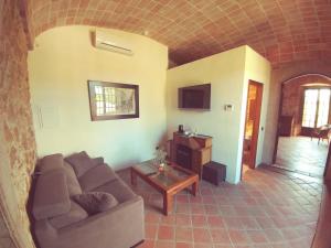 A seating area at Hotel Molí de l'Escala