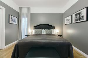 A bed or beds in a room at Hotel Borg by Keahotels