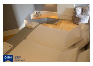 a room with a floor that is under construction at ORM Praça Apartment in Porto +27 photos