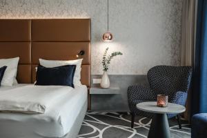 Ένα ή περισσότερα κρεβάτια σε δωμάτιο στο Hotel am Vitalpark
