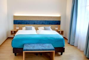 Krevet ili kreveti u jedinici u okviru objekta Hotel & Restaurant Hofmatt
